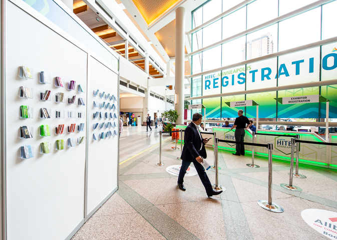 The registration area and ribbon wall at HFTP's HITEC conference in Minneapolis.