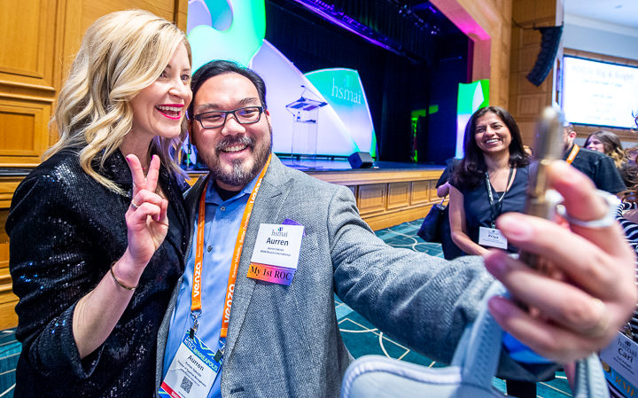 After speaking to the HSMAI conference, author Judi Holler poses for a selfie with a fan.