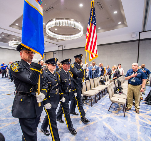 At the start of a corrections industry conference in Minneapolis, the colors are presented by the Minnesota Dept. of Corrections Honor Guard.