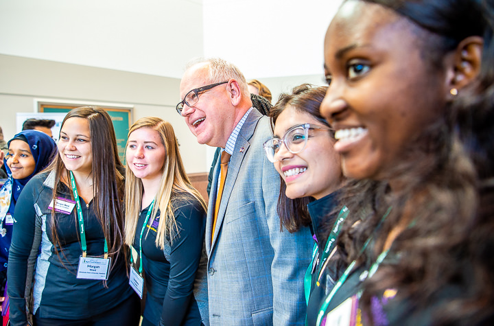 Minnesota Governor Tim Walz poses for a photo with agriculture students at an Ag & Food Summit in S. Paul.