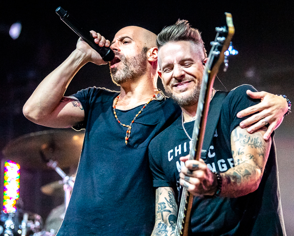 Chris Daughtry and Josh Paul of the band Daughtry perform for a trade show audience at The Armory in Minneapolis.