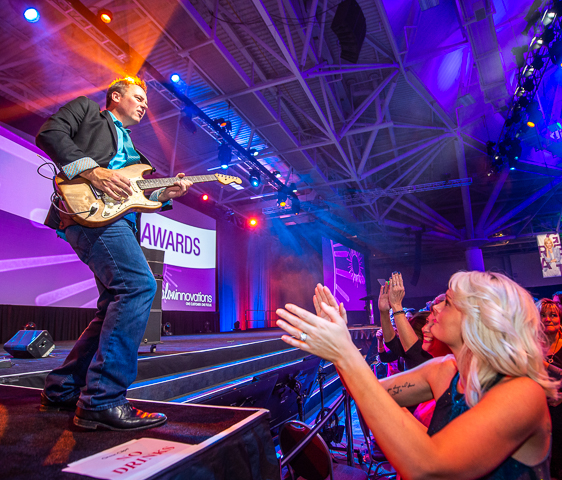David Charles Eichholz of Deuces Wild performs for the Great Clips biannual Convention.