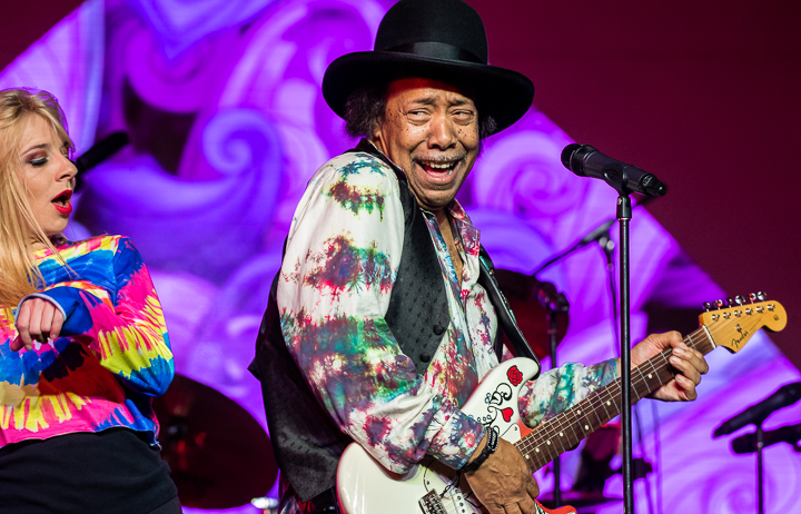 A Jimi Hendrix impersonator performs in San Francisco during a corporate conference.