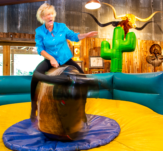 The farewell dinner at Knibbe Ranch for a leadership conference gave this attendee the chance to ride a mechanical bull.
