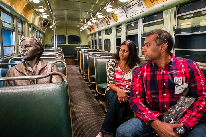 Two conference attendees contemplate a statue of Rosa Parks at the National Museum of Civil Rights in Memphis, TN.