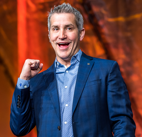 Author Jon Acuff speaks at a conference in Huntington Beach, CA.
