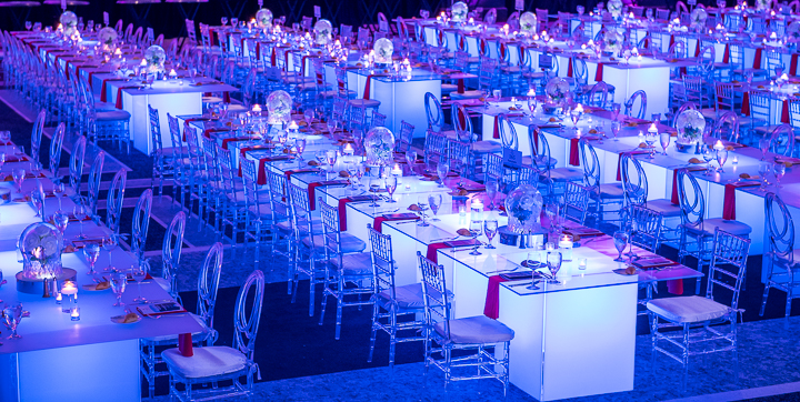 Tables set for an awards dinner in Miami Beach, FL.
